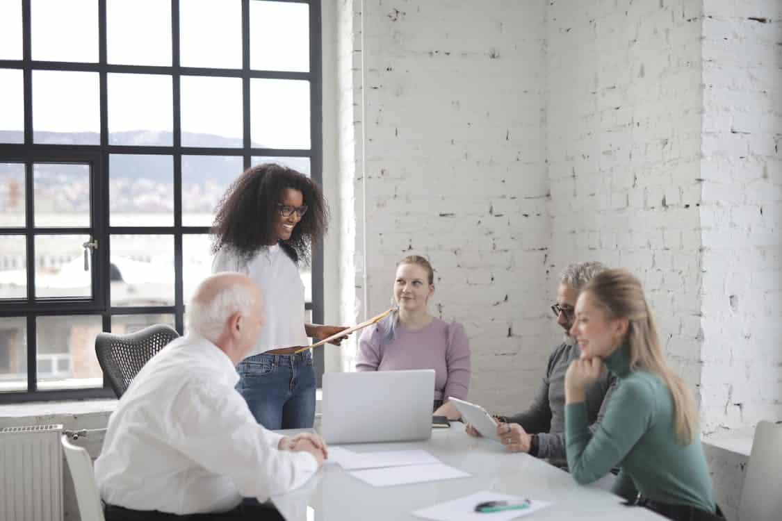 Diverse team collaborating in a bright office.