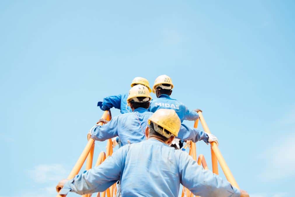 Employees hired after construction background checks.