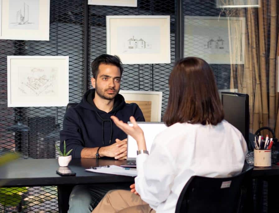 A person following useful hiring tips for managers.